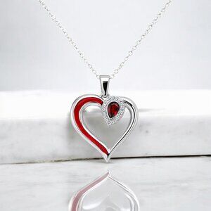 Pear Shaped Garnet and Lab Grown Diamond Heart Pendant in 925 Sterling Silver